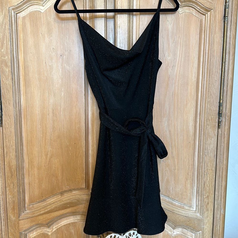 She + sky black sparkly ruffle dress with tie.